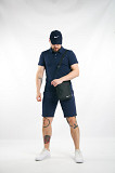 Комплект чоловічий Nike: поло синє + шорти сині + барсетка чорна + кепка синя Київ