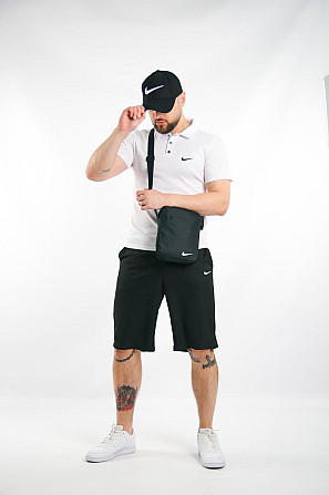 Комплект чоловічий Nike: поло біле + шорти чорні + барсетка чорна + кепка чорна Київ - изображение 1