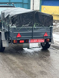 Новий авто причіп 150х130х35 з трикутним дишлом заводу "Дніпро" Ромны