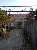 Продам дом с гаражом и теплицей над ним на участке 1,4 сотки Николаев