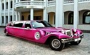 035 Лимузин ретро Excalibur розовый аренда Киев
