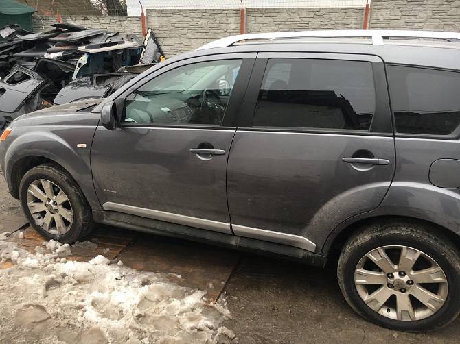 Замок двери передний левый на Mitsubishi Outlander XL Київ - изображение 1