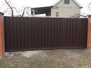 Ворота (откатные, распашные) с зашивкой евроштакетником. Днепр
